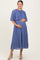 woman wearing a pleated blue maternity dress with flutter sleeves and holding her baby bump