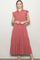 woman wearing a dusty rose tiered maxi dress with a collared neckline and ruffle sleeve details