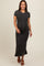 woman wearing a dark gray short sleeve maternity maxi dress and holding her baby bump