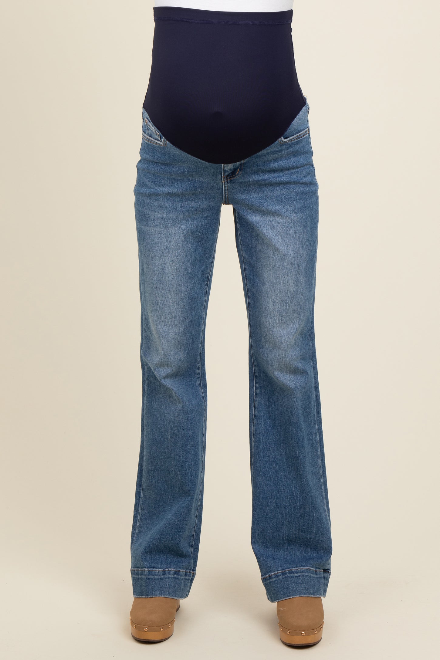 maternity wear blue flared jeans with a navy over-the-bump panel