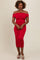 woman wearing a fitted red off-the-shoulder midi dress with ruching details and beige slide-on sandals