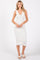 woman wearing a white ribbed midi dress with a v-neck and button details