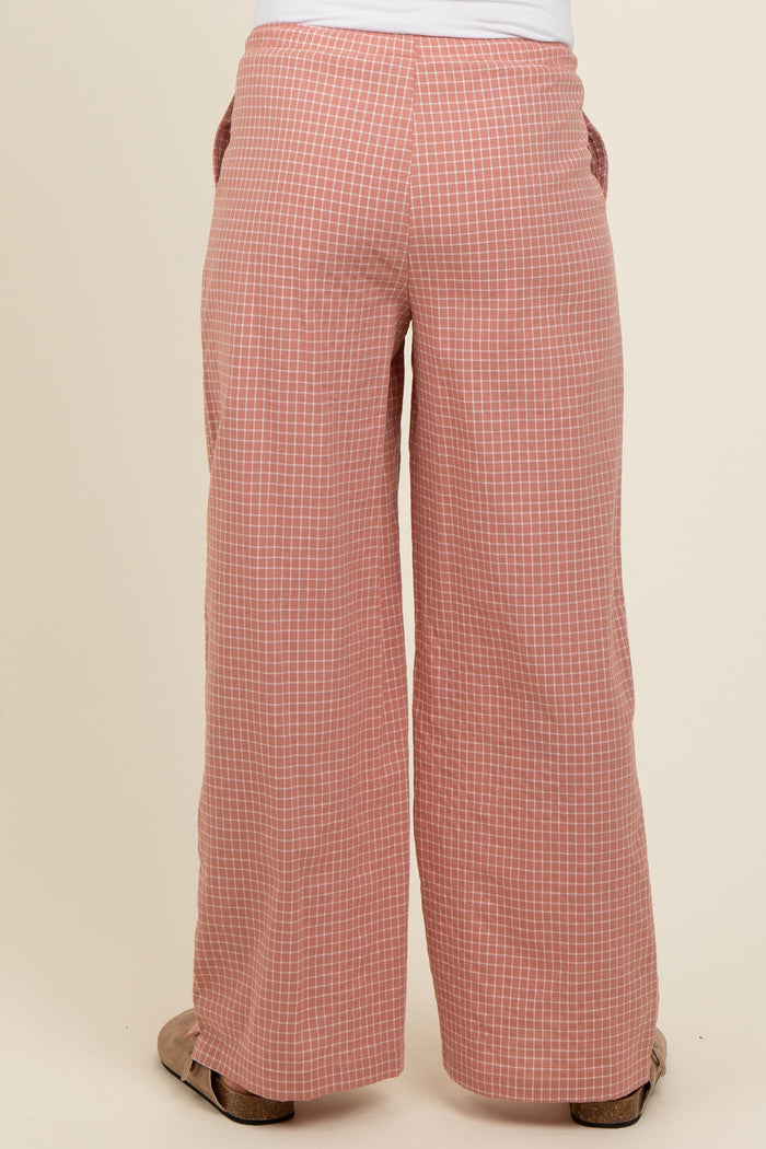 maternity wear pink gingham wide-leg pants with an elastic waistband, shown from the back