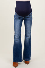 maternity wear dark blue flared jeans with a high waistband for support, model not visible
