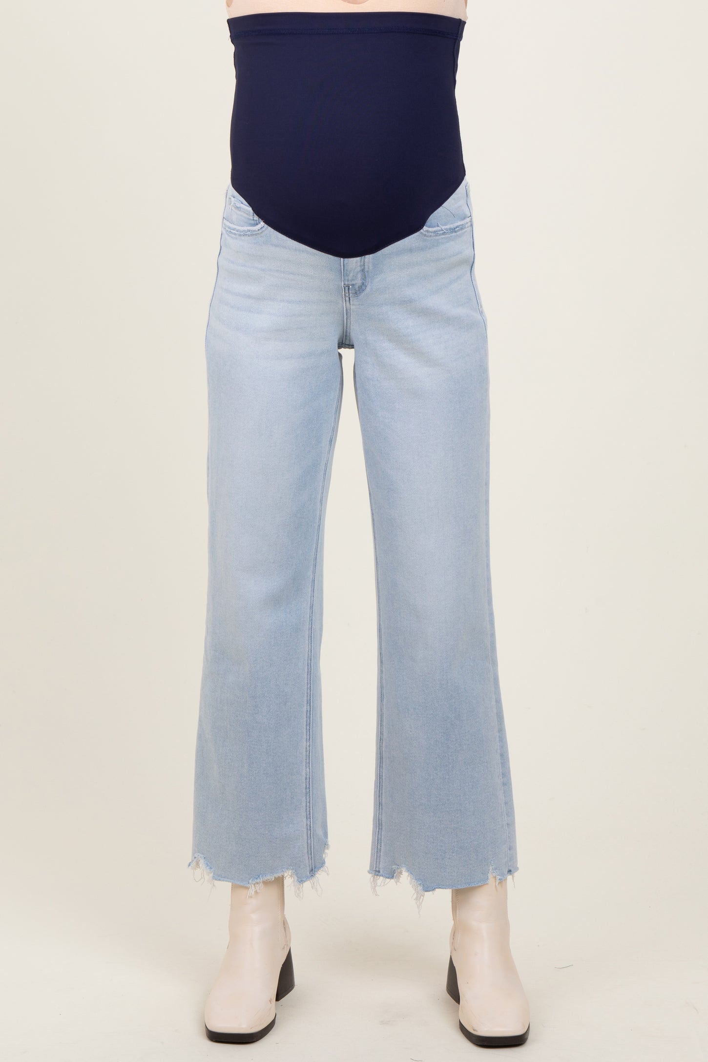 maternity wear light wash wide leg jeans with raw hem and supportive waistband