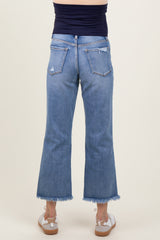 maternity wear light blue flared jeans with a frayed hem, model shown from the back