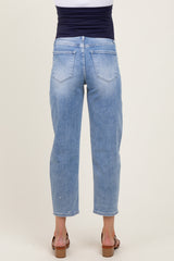 woman wearing light blue maternity jeans with a stretchy dark blue waistband, view from the back