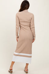 woman wearing a beige ribbed midi dress with white striped details and a fitted silhouette, seen from the back