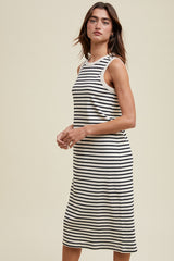 woman wearing a striped sleeveless midi dress in beige and black