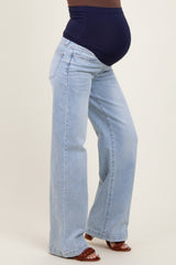 maternity wear light blue wide-leg jeans with a high waistband, model showcasing a visible baby bump