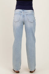 woman wearing light blue maternity jeans, showing the back view with a relaxed fit and straight leg style