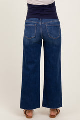 woman wearing blue wide-leg maternity jeans, shown from the back