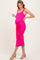 woman wearing a hot pink ribbed maternity dress with a tie waist and a visible baby bump