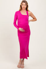 woman wearing a hot pink one-shoulder maternity dress with ruching and a visible baby bump