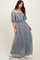 woman wearing a light gray off-the-shoulder maxi dress with lace detail