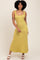 woman wearing a yellow striped sleeveless maxi dress with a fitted bodice and flared skirt