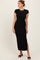 woman wearing a black cap sleeve maxi dress with a knotted waist detail and side slit