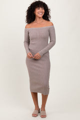 woman wearing a brown and white striped off-the-shoulder ribbed midi dress with long sleeves