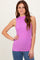 woman wearing a sleeveless ribbed lilac top with a mock neck and long hair styled down