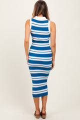 woman wearing a blue and white striped ribbed midi dress, showcasing a fitted silhouette and sleeveless design from the back