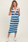woman wearing a blue and white striped maternity dress with a v-neckline and fitted style, showing her baby bump