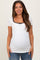woman wearing a white short sleeve maternity top with black bow detail and a visible baby bump
