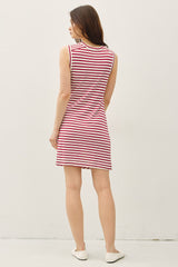woman wearing a sleeveless red and white striped dress, viewed from the back