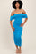 woman wearing a blue off-the-shoulder bodycon dress with ruching detail