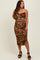 woman wearing a brown leopard print maternity dress with a fitted silhouette and side ruching