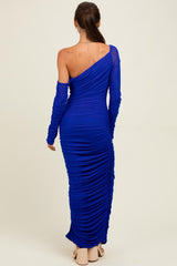 woman wearing a royal blue one-shoulder ruched maxi dress with long sleeves, viewed from the back