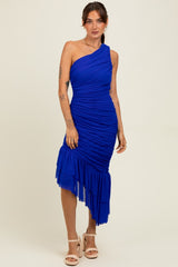woman wearing a one-shoulder bright blue ruched dress with a high-low hem and a ruffle detail