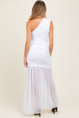 woman wearing a white one-shoulder maternity gown with ruched bodice and flowing skirt