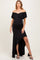 woman wearing a black off-the-shoulder maternity dress with ruffle details and a high-low hem, showcasing her baby bump
