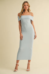 woman wearing a light blue ribbed off-shoulder midi dress with thin straps and a fitted silhouette