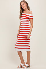woman wearing a red and white striped off-the-shoulder midi dress and white heeled sandals