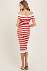 woman wearing a red and white striped off-the-shoulder midi dress with a fitted silhouette and a ribbed texture