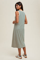 woman wearing a green and white striped sleeveless midi dress, seen from the back