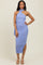 woman wearing a lavender halter neck ruched midi dress with a fitted silhouette and asymmetric hem