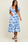 woman wearing a blue and white floral maternity dress with short sleeves and a visible baby bump