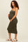 woman wearing an olive green strapless ribbed maternity dress and cradling her baby bump