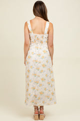 woman wearing a floral print maternity maxi dress with a smocked back, showcasing a comfortable fit