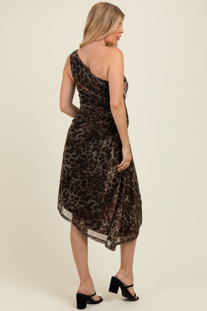 woman wearing a one-shoulder leopard print maternity dress, showcasing a ruched back detail
