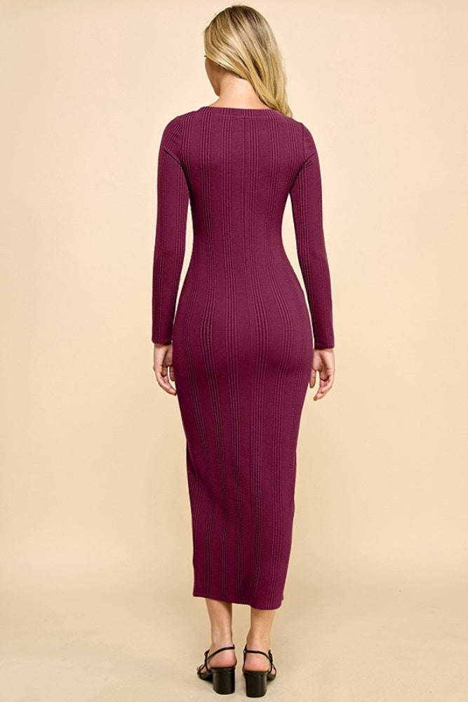 woman wearing a maroon ribbed long sleeve maxi dress, viewed from the back