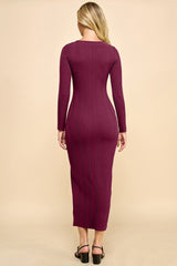 woman wearing a maroon ribbed long sleeve maxi dress, viewed from the back