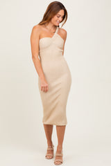 woman wearing a nude ribbed midi dress with a sweetheart neckline and one shoulder strap