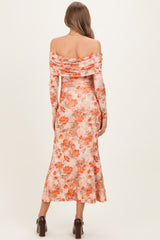 maternity wear off-the-shoulder floral dress in soft peach tones, long sleeves, and fitted silhouette, shown from the back