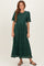 woman wearing a dark green lace maxi dress with short sleeves and a flared skirt