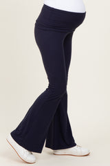 maternity wear navy blue flared pants with a comfortable waistband, featuring a visible baby bump