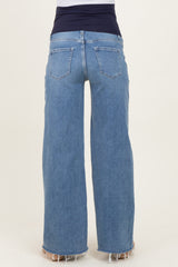 woman wearing light blue maternity wide-leg jeans with a stretchy black waistband, seen from the back