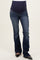 woman wearing dark blue maternity bootcut jeans with a stretchy navy waistband and flared leg design, showing her baby bump
